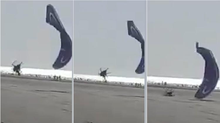 Repodução de vídeo que mostra a queda do piloto de paramotor na praia do Calhau, em São Luís  - Reprodução/Instagram @livianenascimen - Reprodução/Instagram @livianenascimen